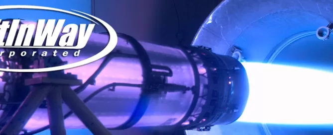 A jet engine undergoes testing, with a visible blue flame, beside the SoftInWay Incorporated logo.